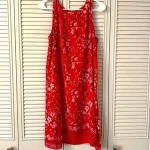 Red and pink floral detail dress. Sits just about the knees!